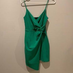Kelly green Lulus bodycon asym hem dress. Mini. Never worn. Size medium.